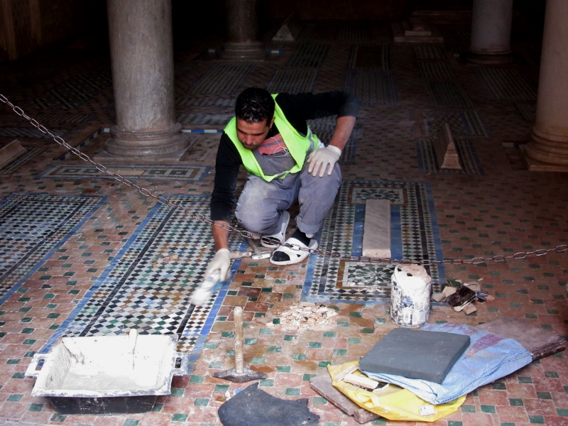 Mosaic artist at work at the Saadian Tombs Marrakesh